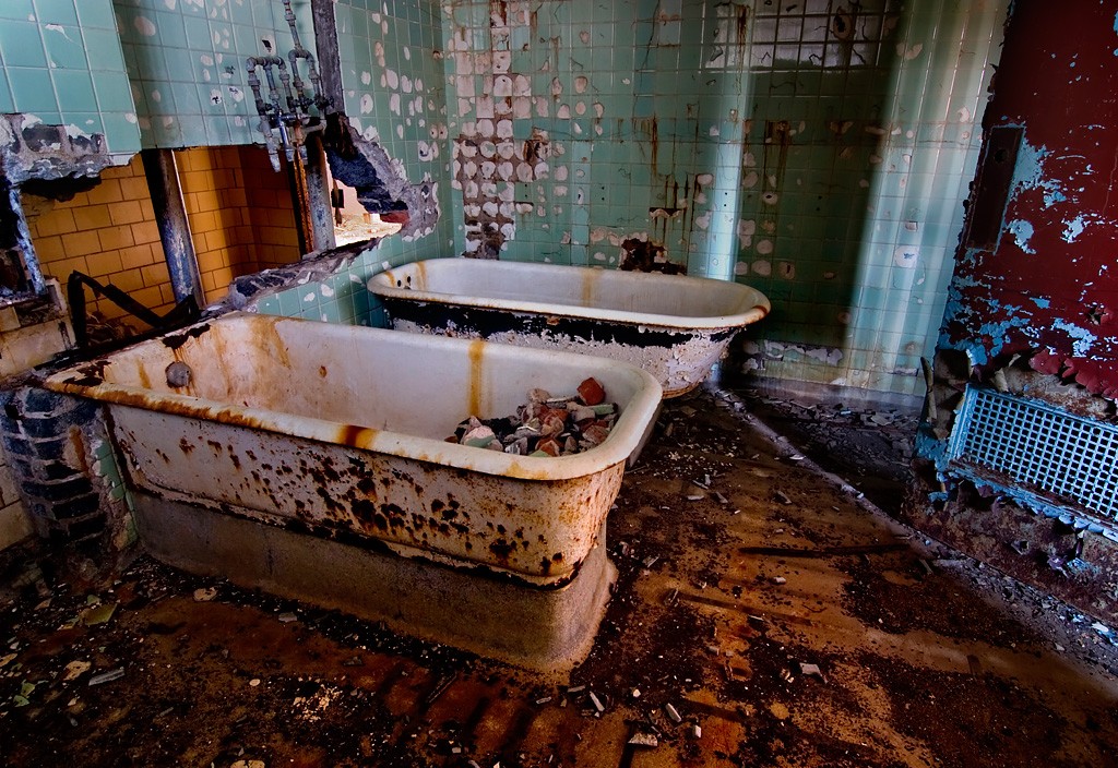 Rusting Tubs - Photo of the Abandoned Ypsilanti State Hospital